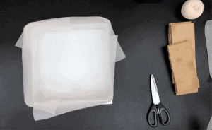 Lining square tin with parchment